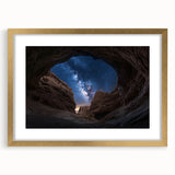 Gold-framed landscape art print showcasing stunning canyons in vibrant colors, elegantly matted for a polished look, perfect for home decor.