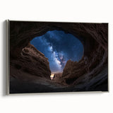 Framed canvas art depicting a stunning landscape of colorful canyons, featuring a sleek silver frame that enhances its vibrant hues and texture. Perfect for home decor.