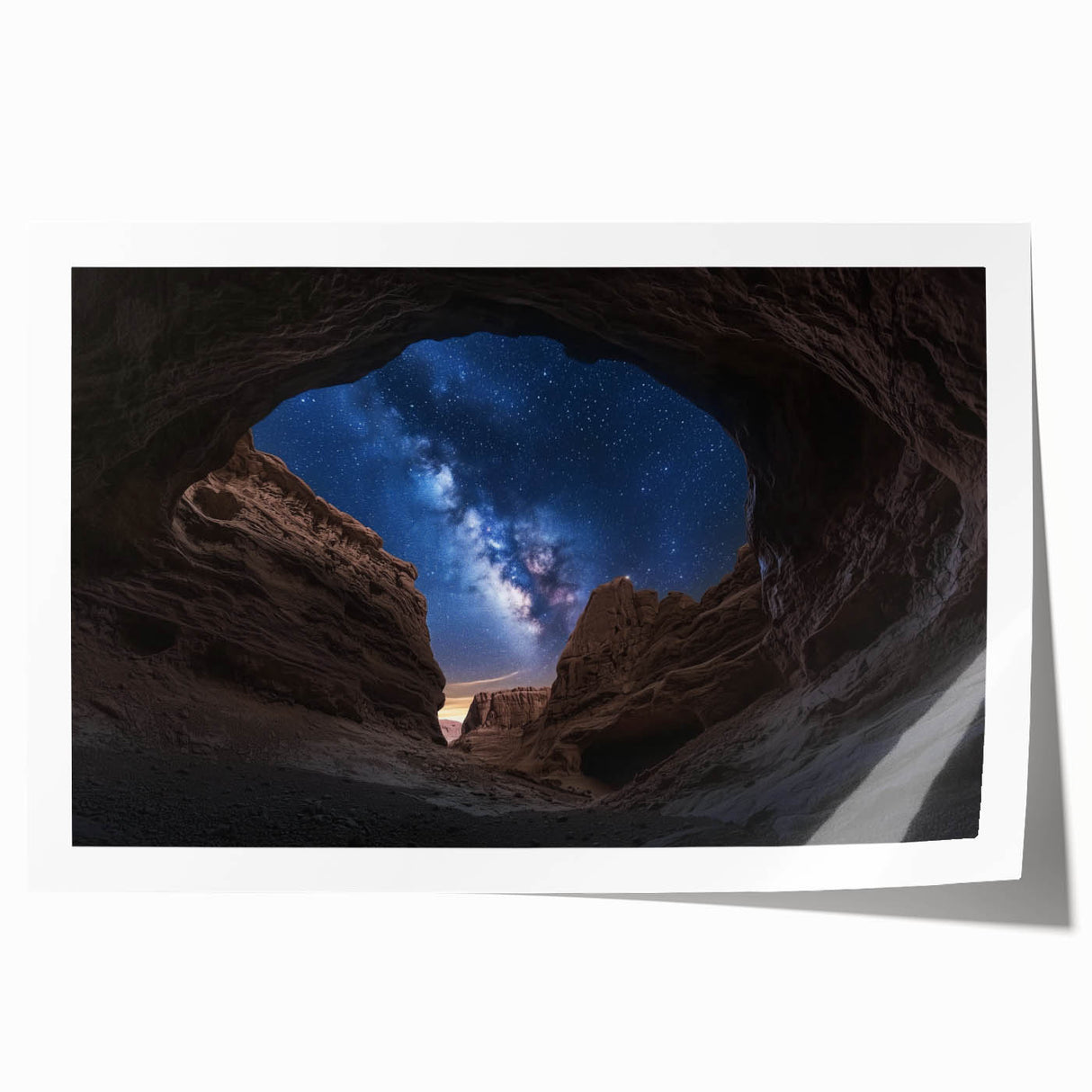 Vibrant landscape print of canyons in warm earthy tones, rolled and ready for display, showcasing intricate details of natural rock formations and textures.