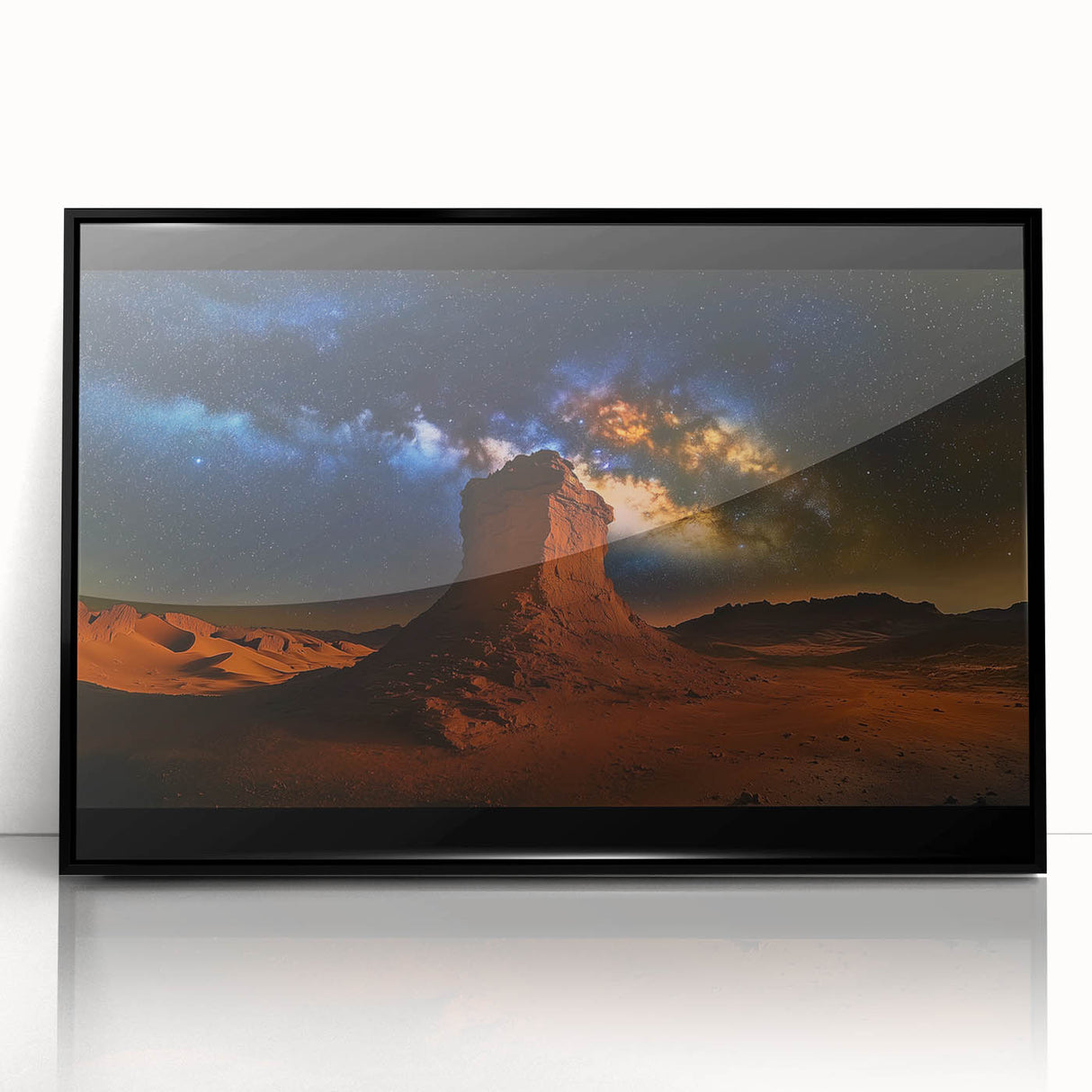 Framed acrylic artwork depicting a vibrant desert landscape with warm hues of orange and gold, featuring intricate details and a sleek black frame, perfect for modern decor.