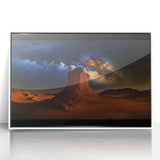 Framed acrylic artwork showcasing a vibrant desert landscape with striking orange and red hues, set against a sleek white frame, perfect for modern home decor.