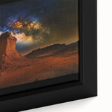 Close-up of a framed desert landscape canvas print, showcasing warm hues of orange and brown with intricate textural details, perfect for enhancing home decor.