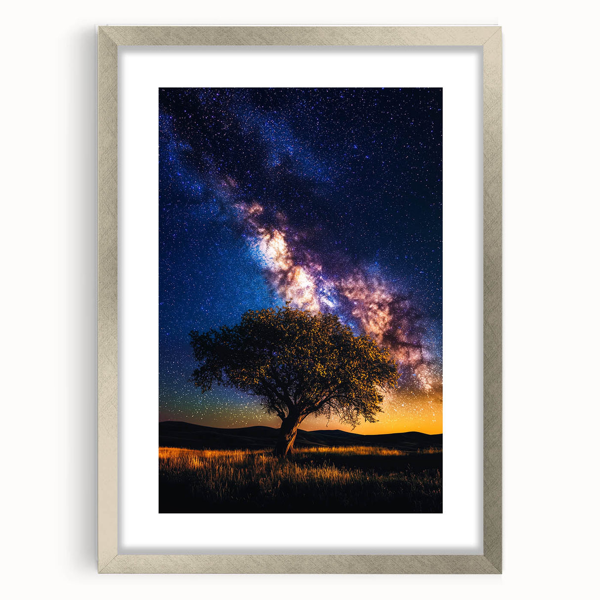 Silver-framed landscape artwork featuring vibrant green fields and a dramatic sky, elegantly matted for a refined presentation, perfect for home decor.