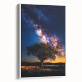 Framed canvas artwork showcasing a vibrant landscape scene with lush green fields, displayed from the side. Ideal for enhancing home decor with nature-inspired aesthetics.