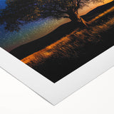 Vibrant rolled canvas artwork depicting a serene landscape with lush green fields under a clear blue sky, expertly wrapped for easy display and shipping.