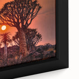 Extra large framed canvas featuring a textured depiction of an African landscape in black with colorful accents.