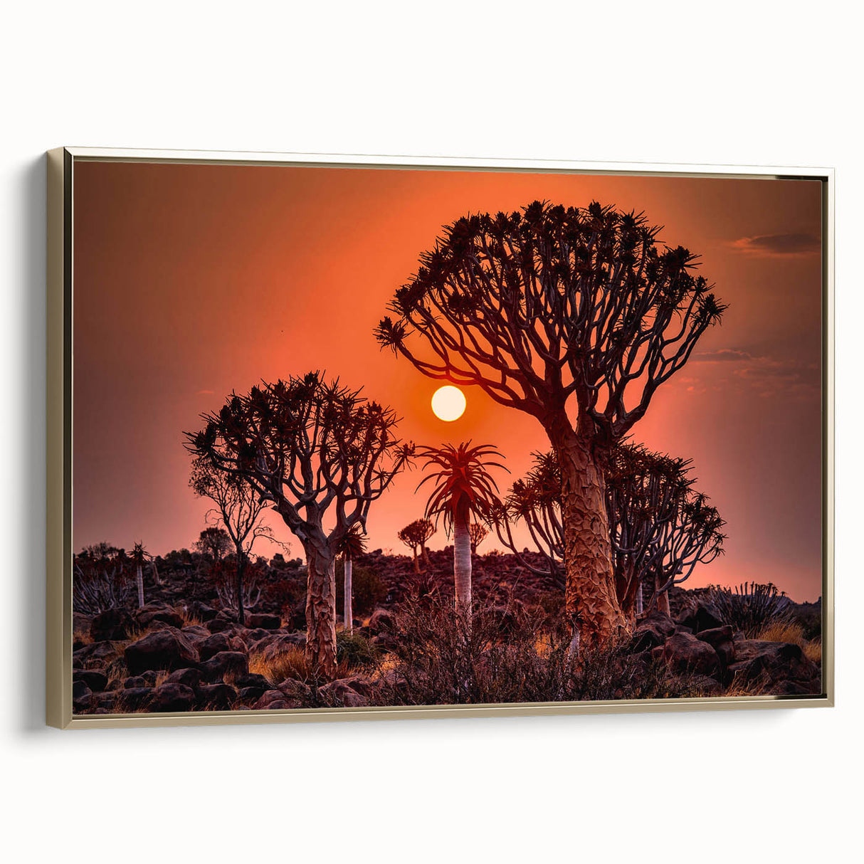 Framed canvas featuring a vintage-style landscape art painting of the Namibian desert with vibrant orange and gold tones.