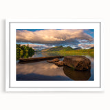 Textured art print of abstract Cumbria landscape in muted earth tones, framed with a white mat, suitable for bedroom decor.