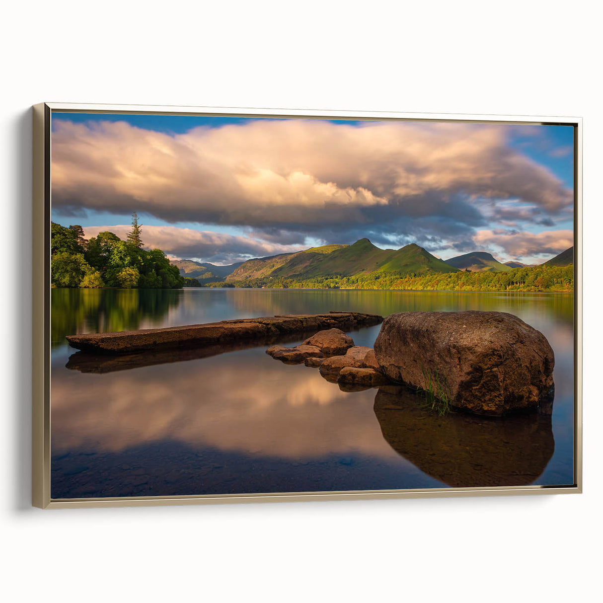 Framed canvas featuring a vintage-style landscape painting of Cumbria, England, in muted earth tones.