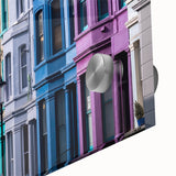 Large abstract wall art depicting a stylized London skyline in muted gray and blue tones on acrylic glass.