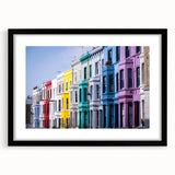 Abstract art print of a colorful London skyline, in a black frame with a mat, ideal for living room decor.