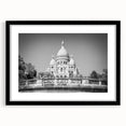 Abstract art print of a colorful Paris skyline in textured style on a large framed canvas, ideal for living room decor.