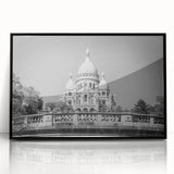 Large abstract wall art depicting a Parisian scene in muted gray and blue tones on a framed acrylic.