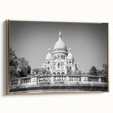 Framed canvas wall art depicting a vintage-style Paris landscape in muted gold and black tones, ideal for bedroom decor.
