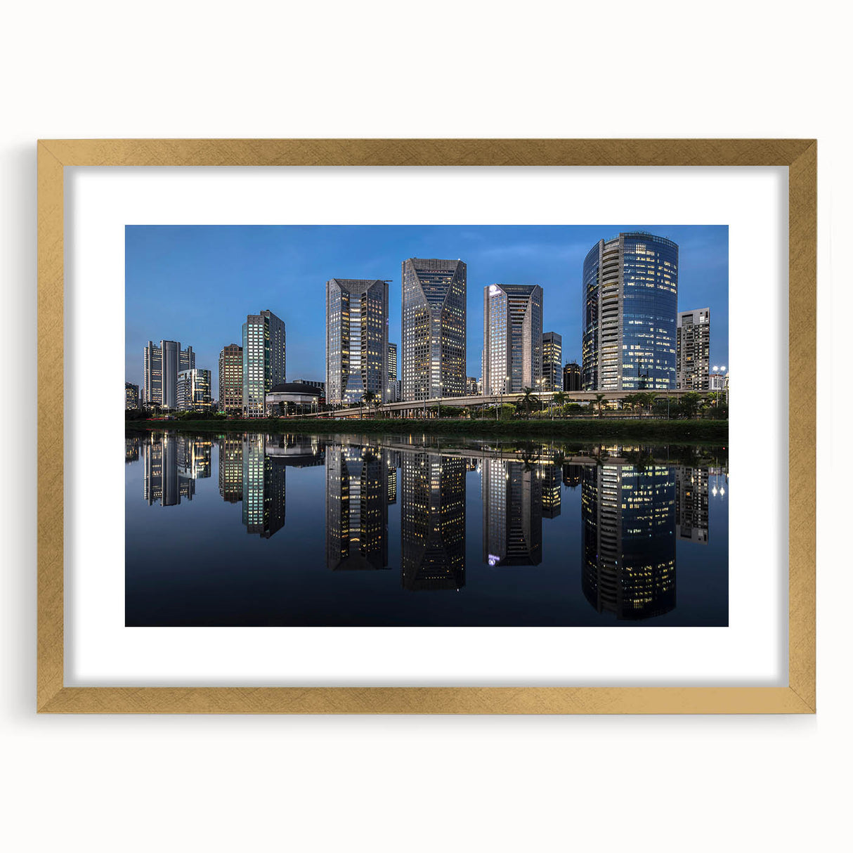 Extra large abstract art print depicting a textured Brazilian landscape in earth tones, framed in gold.