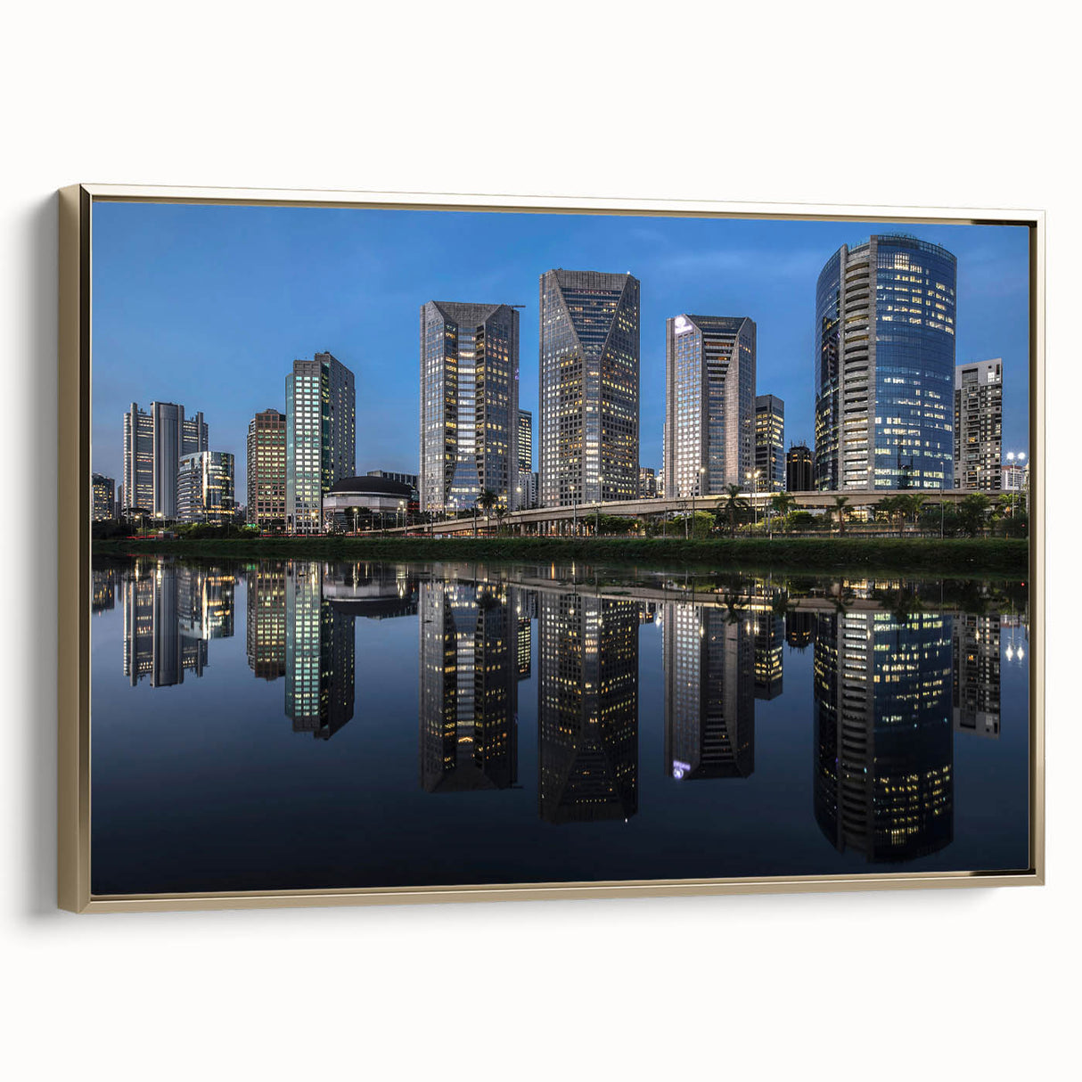 Framed canvas featuring a vintage poster art style landscape of South America with black and gold tones.