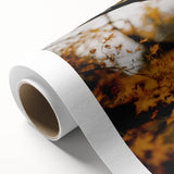 Art deco poster of autumn trees in orange and brown tones on rolled canvas.