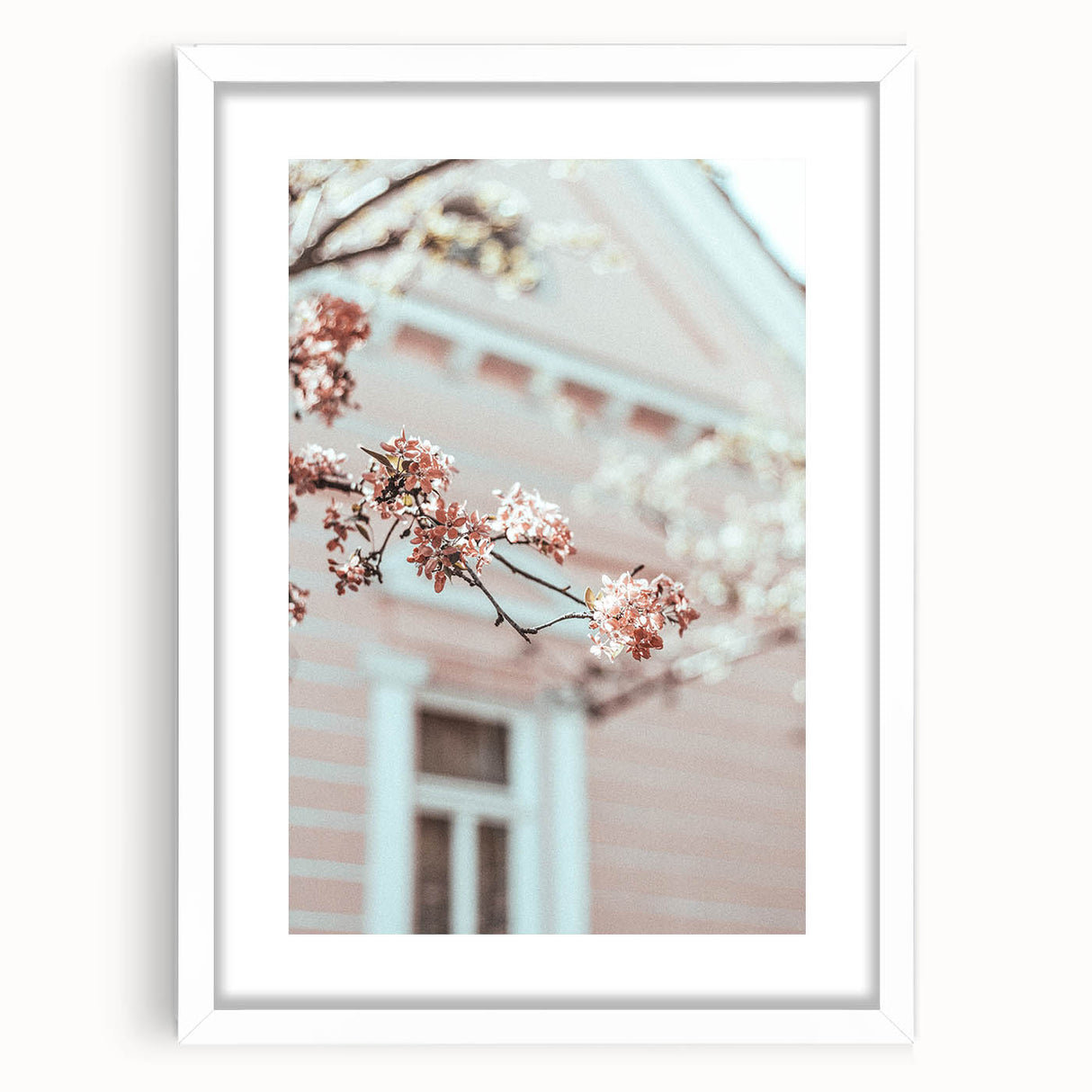 Abstract art print featuring swirling spring colors in green and yellow on a white framed canvas.