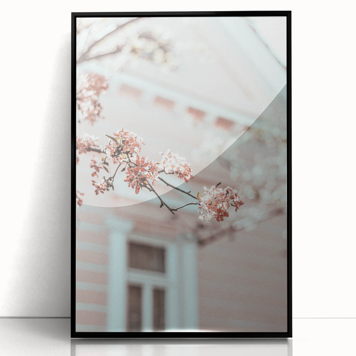 Large abstract wall art featuring swirling blue and green hues on a black acrylic framed print.