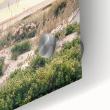 Large abstract wall art in vibrant orange and blue tones on acrylic glass.