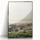 Mid-century modernist art poster featuring geometric shapes in pastel colors on a silver-framed acrylic.