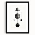Abstract minimalist wall art framed in black with a mat, showcasing simple geometric shapes and soft color tones, ideal for modern home decor.