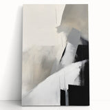Abstract minimalist wall art featuring soft, muted colors on a stretched canvas, leaning against a textured wall, ideal for modern home decor aesthetics. The design showcases fluid shapes and subtle tones, creating a calming atmosphere.