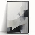 Abstract minimalist wall art in a sleek black frame, showcasing a modern design with geometric shapes, perfect for contemporary home decor.
