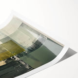 Abstract minimalist wall art print showcasing soft pastel colors and geometric shapes, elegantly rolled and packaged in a protective cardboard tube for easy display.