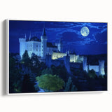 Framed canvas artwork depicting a serene landscape with a majestic castle, presented in a white frame, ideal for enhancing home decor and creating a tranquil ambiance.