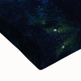 Close-up of a stretched canvas depicting a vibrant landscape featuring a majestic castle surrounded by lush greenery, showcasing intricate details and rich colors for home decor.