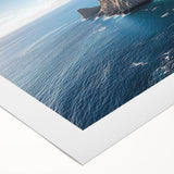 Vibrant rolled canvas showcasing stunning landscape cliffs in rich hues, elegantly packaged in a protective cardboard tube for easy display and shipping.