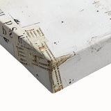 Close-up of a stretched canvas featuring abstract architecture wall art, showcasing intricate geometric patterns in muted tones of blue and gray, ideal for modern decor.