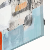 Abstract acrylic splatters in vibrant hues of blue, yellow, and red on glass surface, showcasing a modern artistic design ideal for contemporary decor.