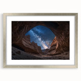 Framed landscape art print of canyons in silver frame with white mat, showcasing vibrant colors and intricate details, perfect for home decor enhancement.