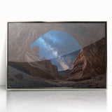 Framed acrylic artwork of a stunning canyon landscape in silver tones, showcasing dramatic rock formations and vibrant colors, perfect for modern home decor.