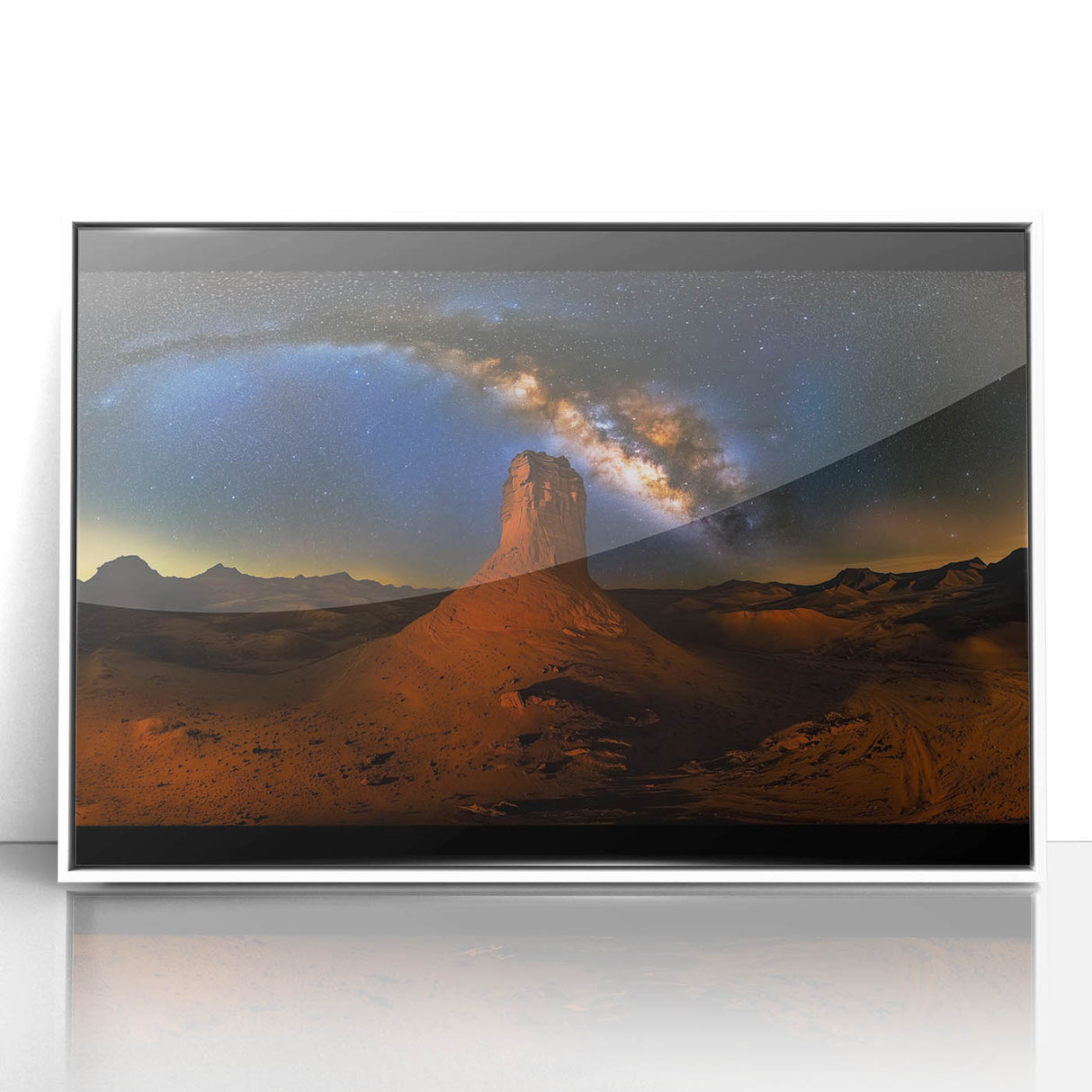 Framed acrylic artwork of a vibrant desert landscape showcasing warm hues of orange and yellow, elegantly presented in a sleek white frame, ideal for modern home decor.
