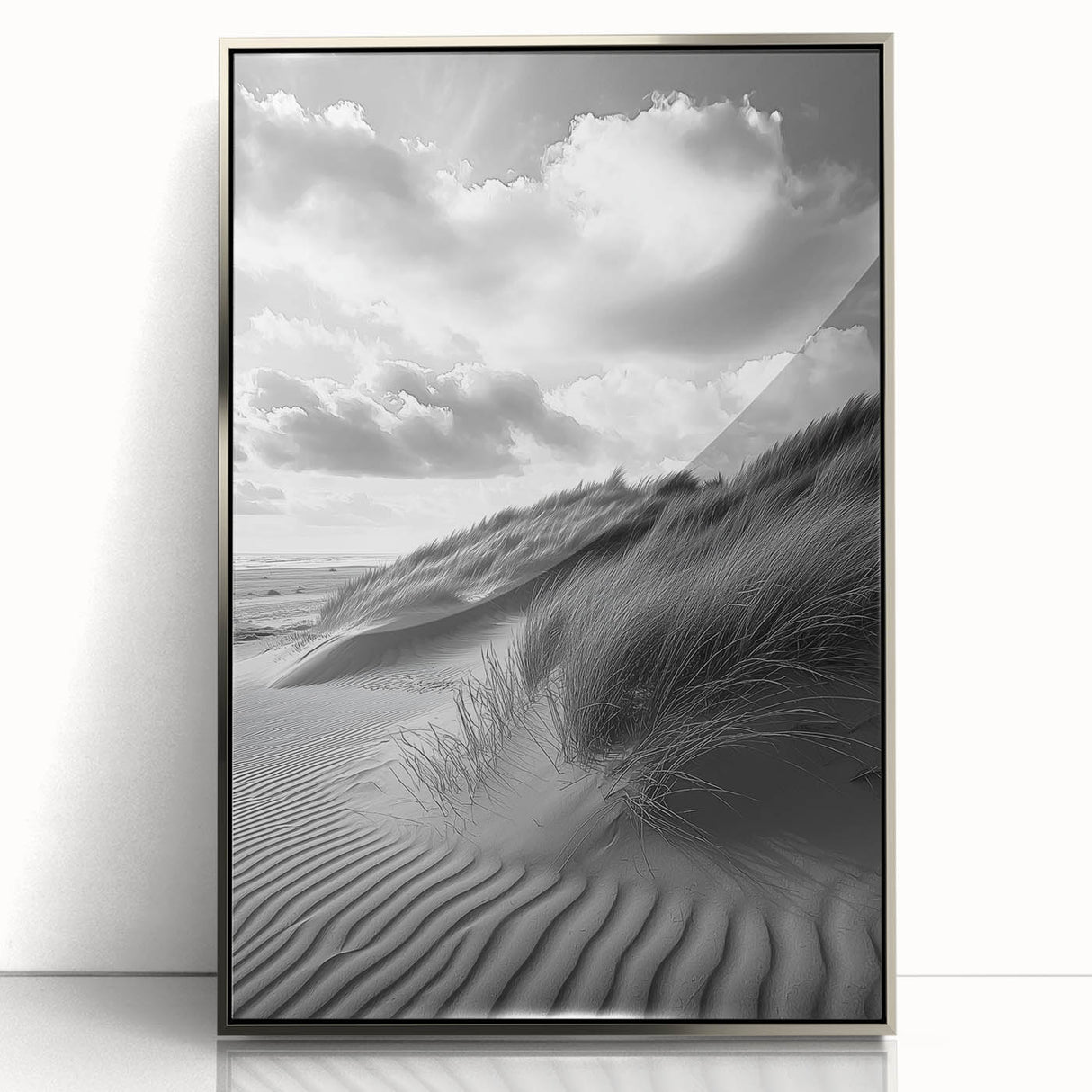Framed acrylic artwork showcasing a serene dune landscape with soft beige and gold tones, elegantly displayed with a sleek silver frame, ideal for modern decor.