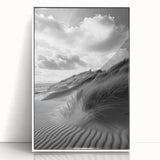 Framed acrylic artwork showcasing serene desert dunes in soft beige and gold tones, presented in a sleek white frame, perfect for modern home decor.