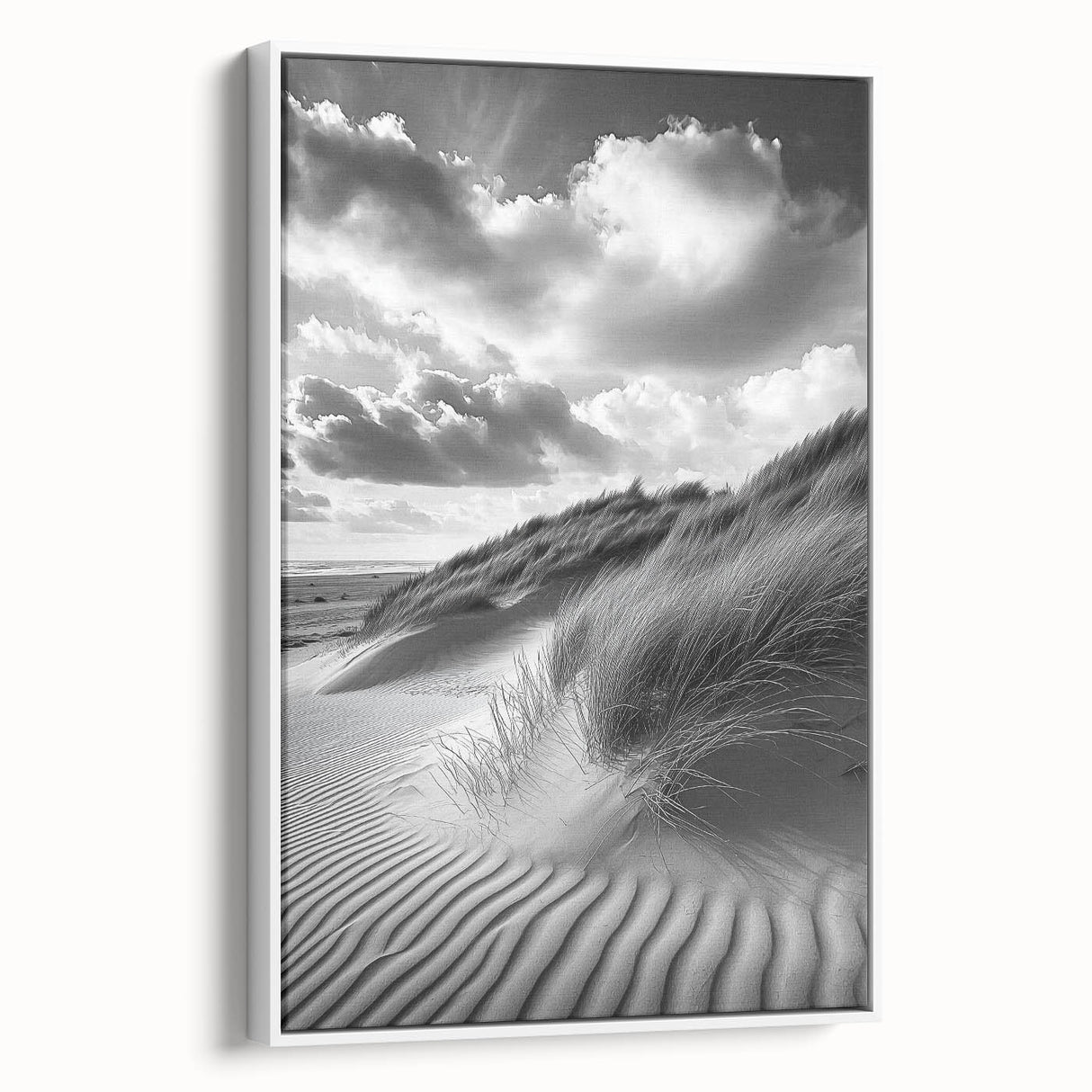 Framed canvas artwork featuring serene desert dunes in soft beige and gold tones, displayed against a white wall, perfect for modern home decor.