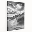 Stretched canvas artwork depicting serene sand dunes at sunset, showcasing warm golden and orange hues, perfect for enhancing living spaces with a tranquil vibe.