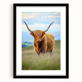 Black frame showcasing a landscape print featuring vibrant green fields under a blue sky, designed with a white mat for a polished look. Ideal for home decor.