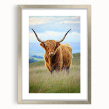 Framed landscape artwork showcasing vibrant green fields and a serene blue sky, enhanced by a silver mat and frame, perfect for home decor.