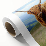 Vibrant rolled canvas artwork showcasing a serene landscape of rolling fields under a bright blue sky, ideal for home or office decor, packaged in a protective tube.