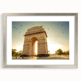Textured abstract art print depicting an Indian scenery in muted earth tones, framed with a silver mat.