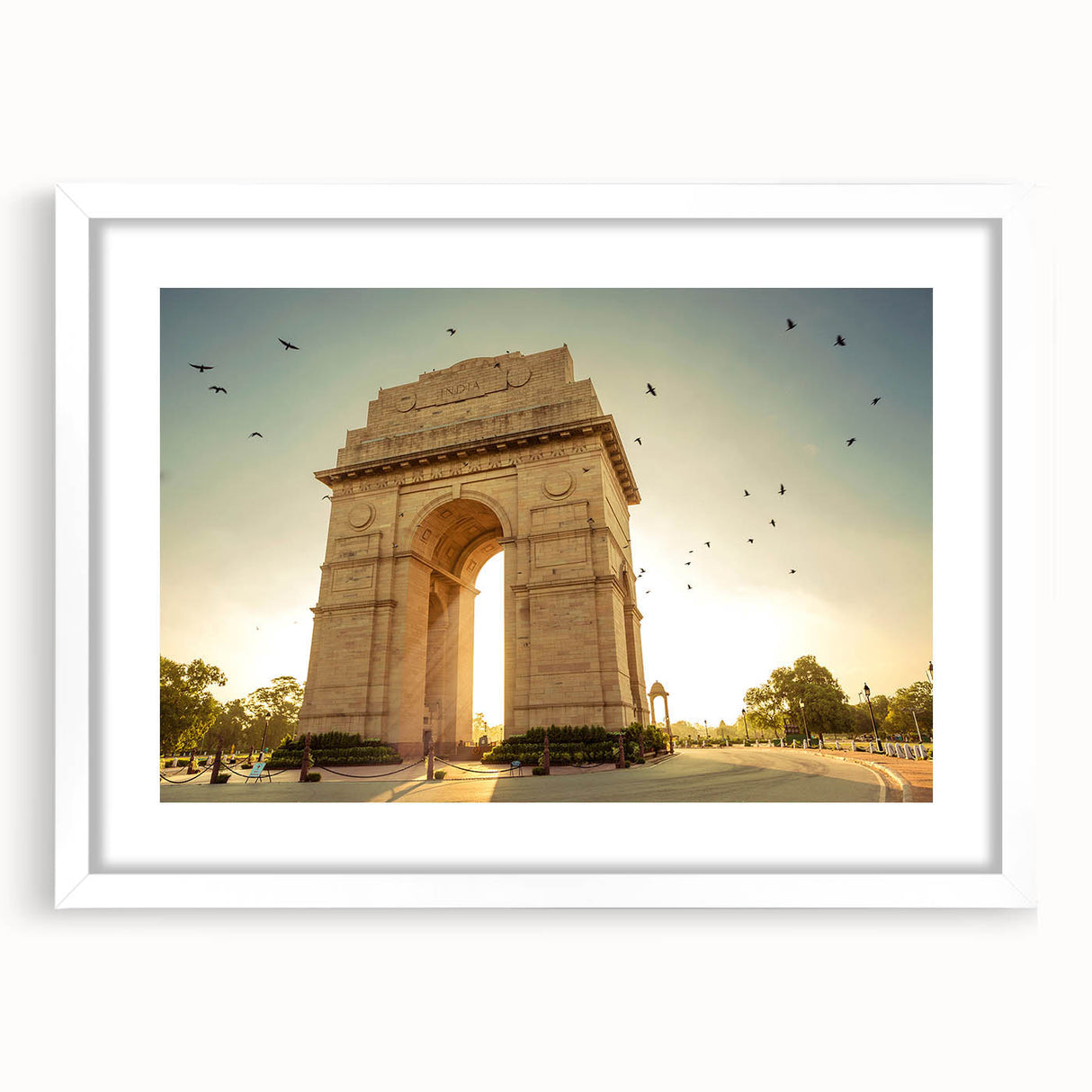 Abstract art print depicting a serene Indian landscape in soft pastel shades, framed with a white mat.