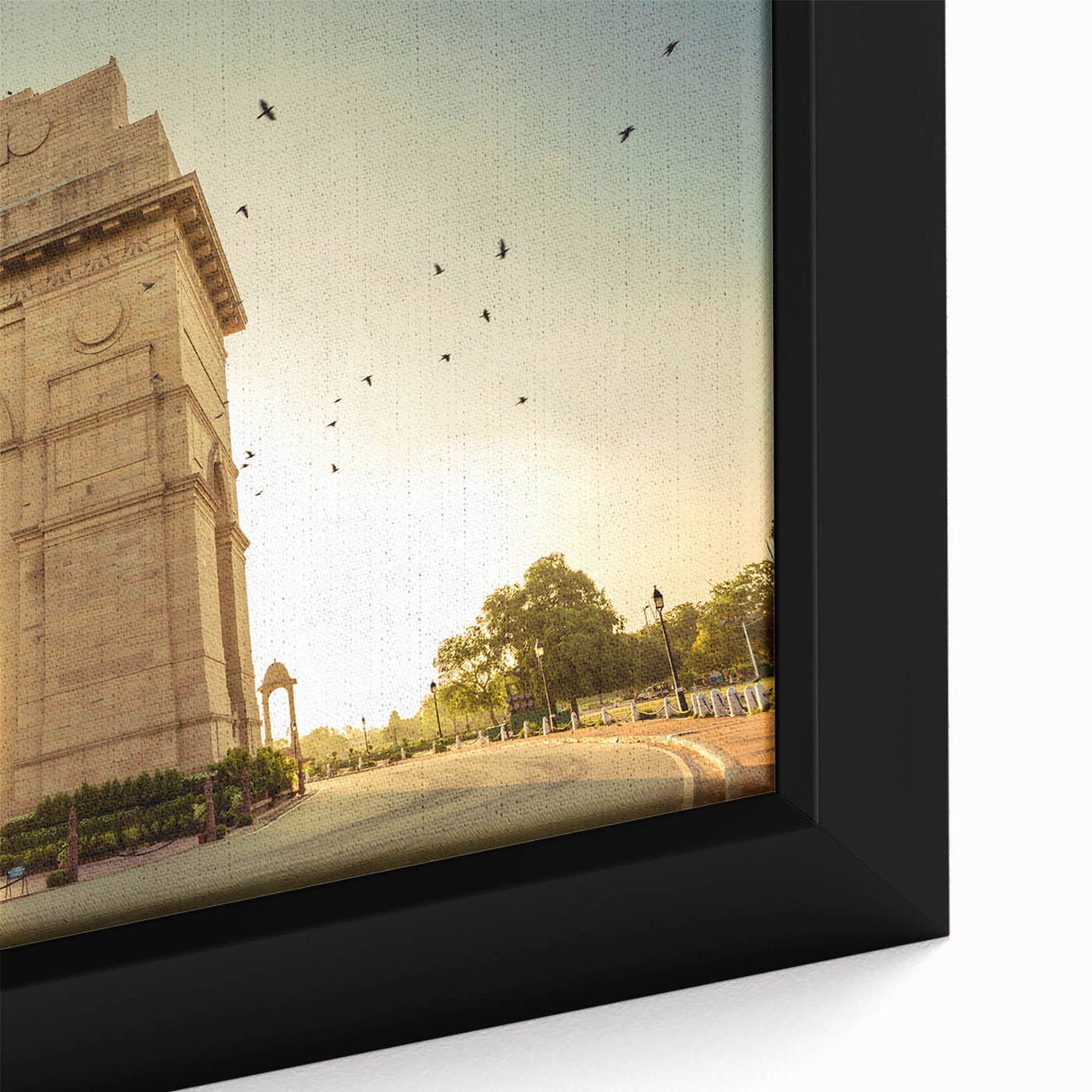 Extra large framed canvas featuring a textured depiction of a vibrant, colorful Indian scenery on a black background.