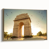 Framed canvas featuring a vintage-style landscape painting of an Indian scenery in gold and black tones.