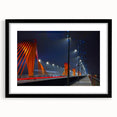 Extra large abstract art print of a vibrant, colorful European scenery on textured canvas, framed in black.
