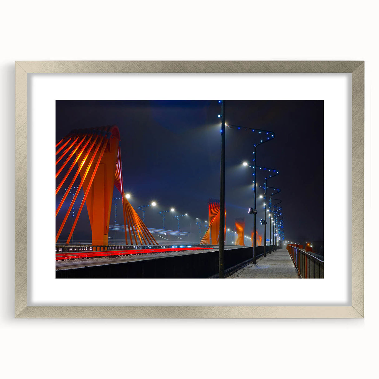 Extra large abstract art print of a textured European landscape in muted earth tones, framed in silver.